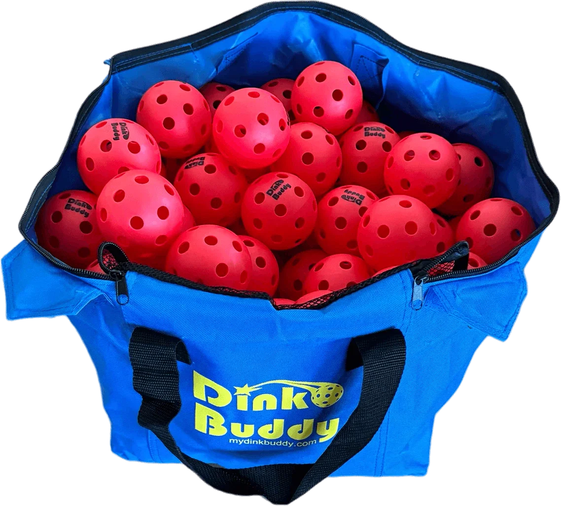 Blue Dink Buddy bag filled with red pickleballs, brand name visible on balls and bag