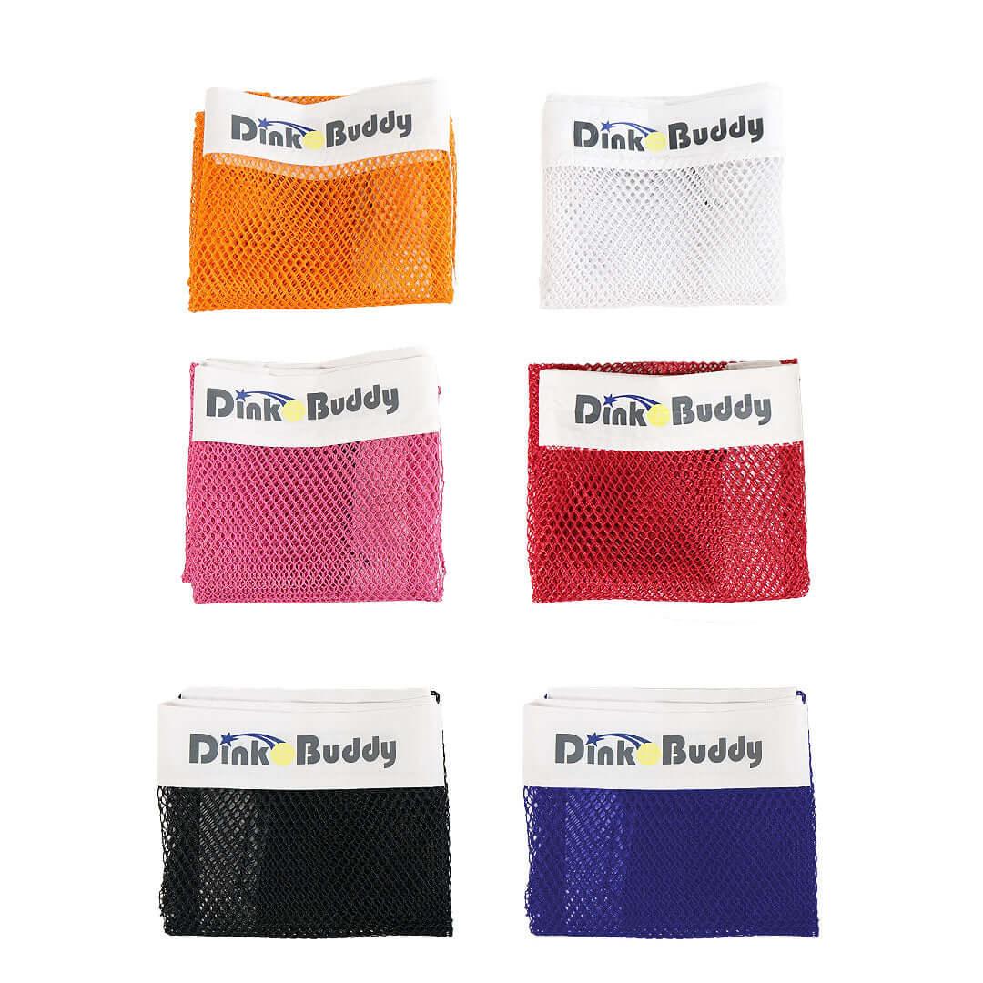 Six Dink Buddy colorful mesh pickleball nets in orange, white, pink, red, black, and blue