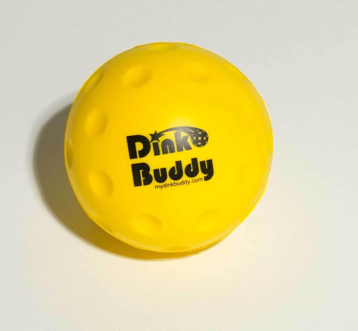 Yellow Dink Buddy pickleball with logo on white background